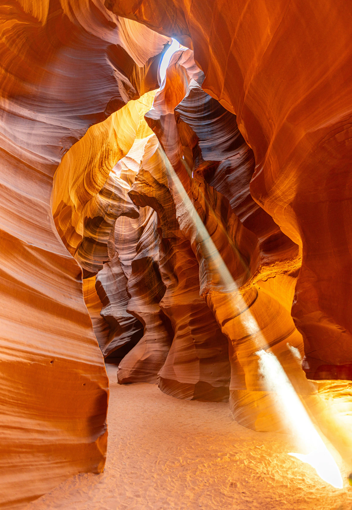 Sunlit sandstone walls inside Antelope Canyon