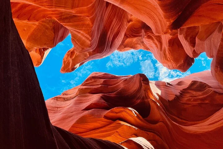 Blue sky framed by red sandstone in Antelope Canyon